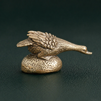 Antique Brass Goose in Pursuit Figurine