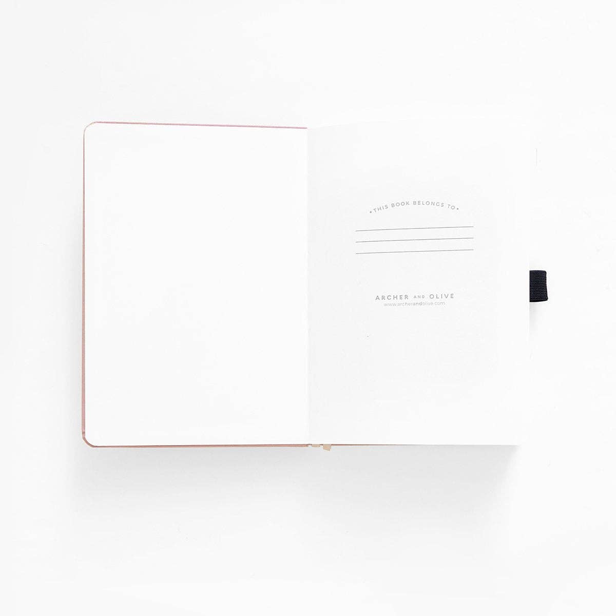 Storybook in Plum Dot Grid Pocket Journal
