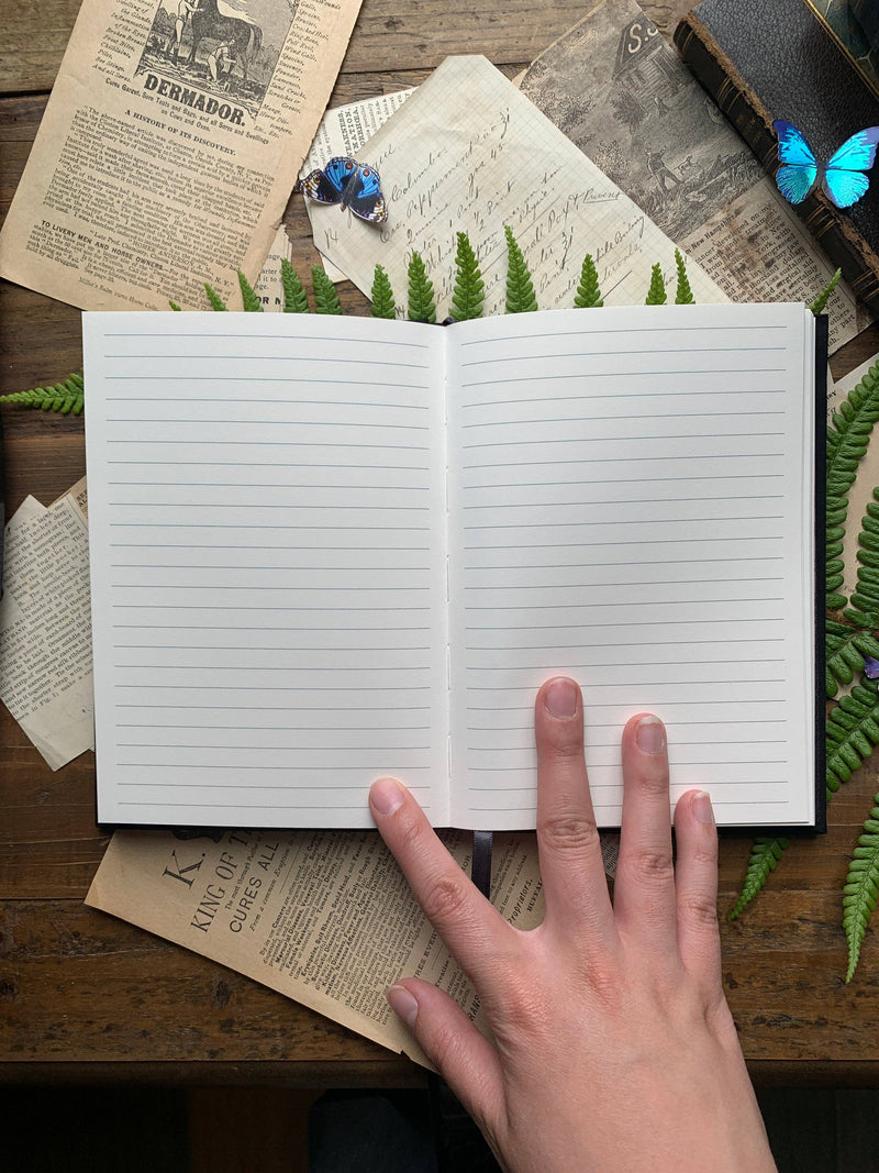 Woodland Cottage Lined Journal with Black Linen Binding & Foil Stamping